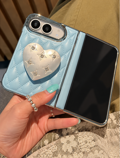 Blue quilted case and silver heart stand detail