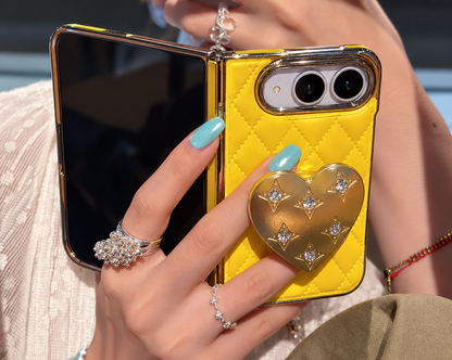 Yellow quilted case and gold heart stand detail