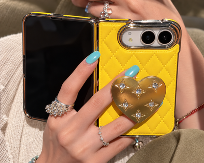 Yellow iPhone Duo with gold heart stand, detail view